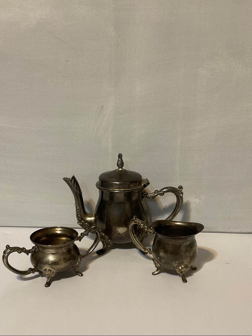Ornate Silver-Color Tea Pot with Decorative Handle and Spout